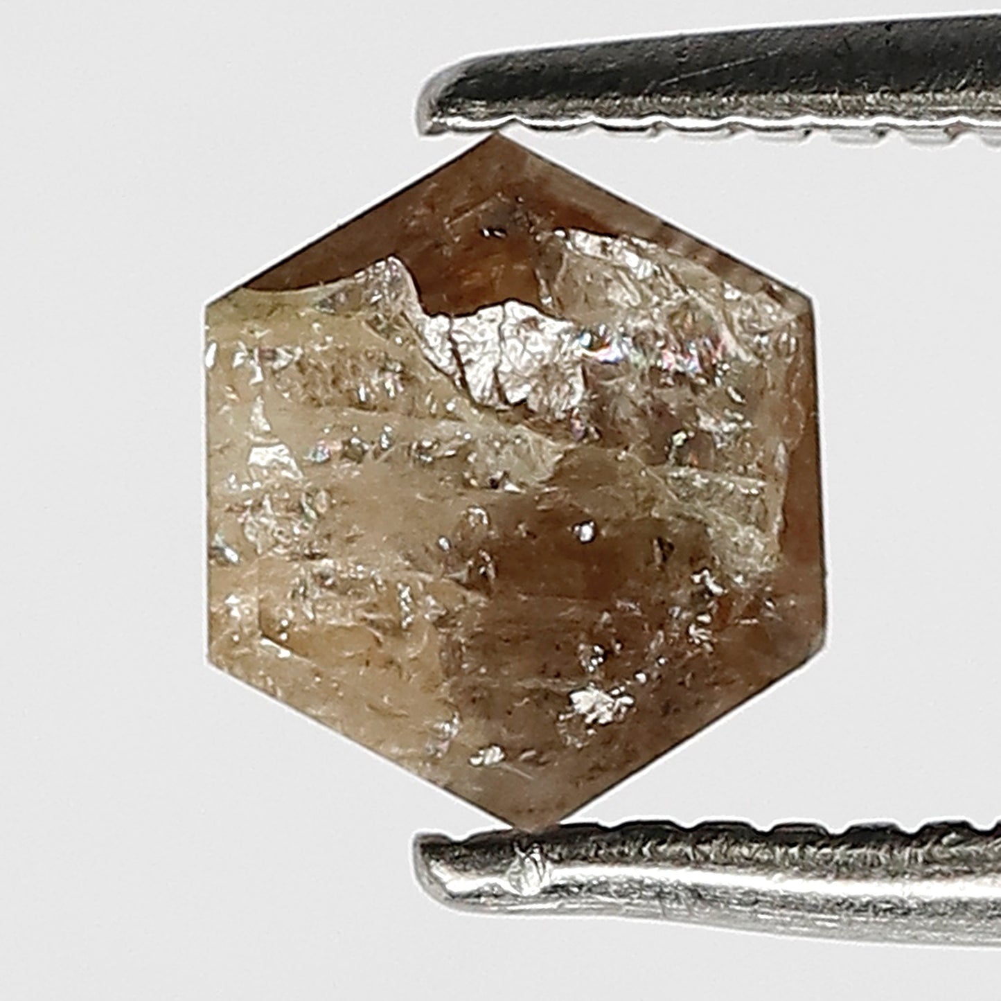 0.82 Ct Natural brownish red color Hexagon shaped Salt and pepper Loose ring