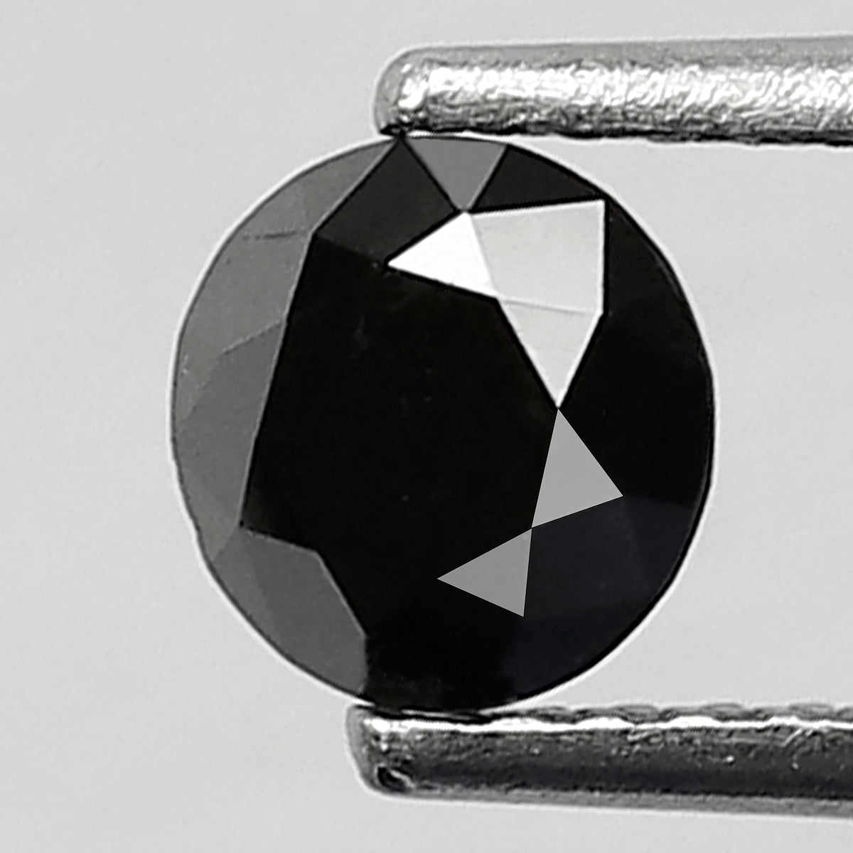 0.68 Carat Round Brilliant Cut Black Diamond, Heated Jet Black, Full Faceted