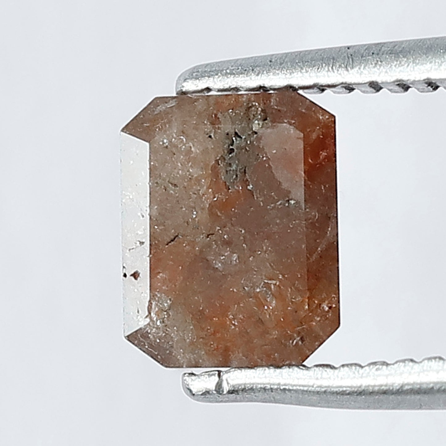 Fancy Dark Reddish Color Emerald Shape Rustic Diamond 0.89 Carat