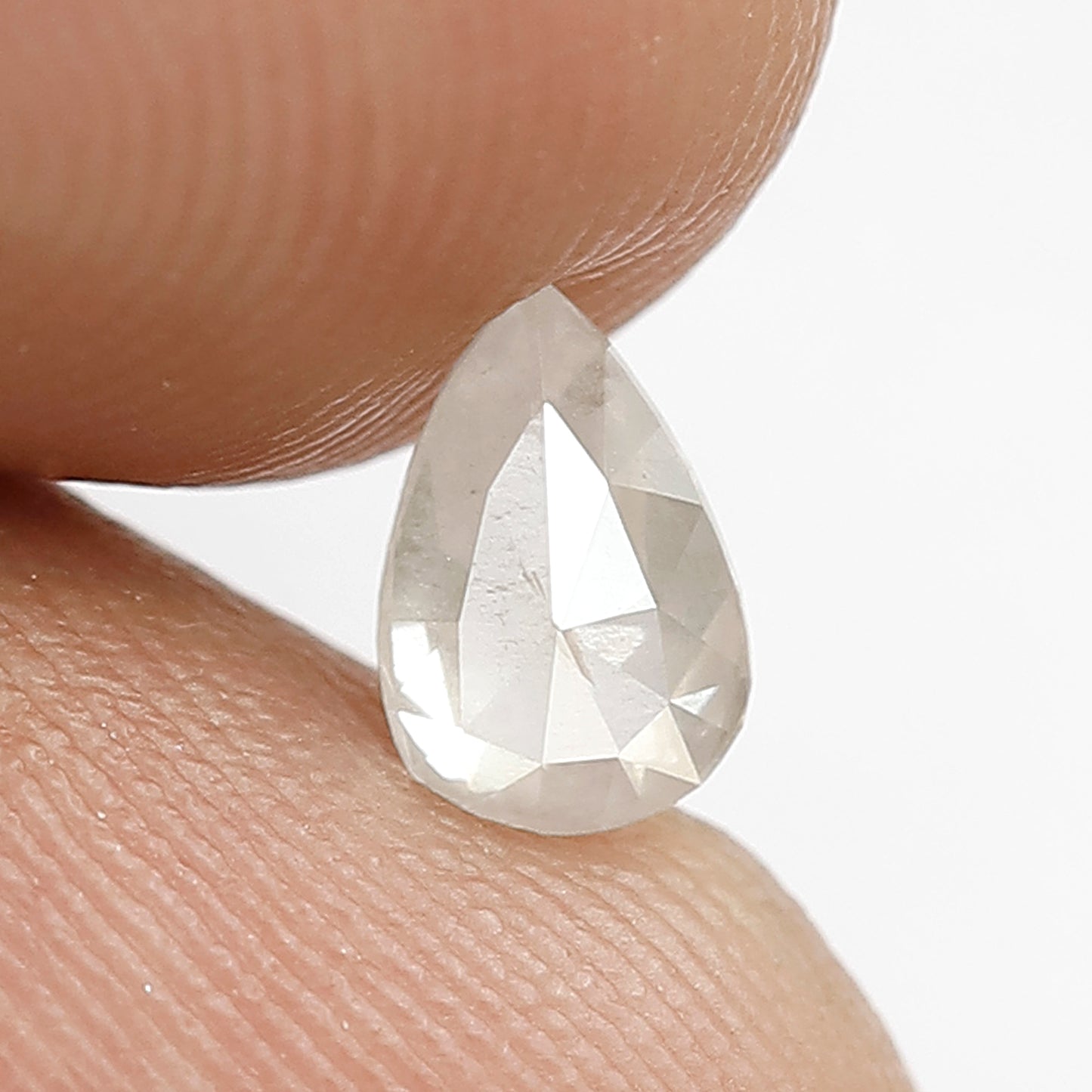 0.57 CT Pear shape Natural loose Misty White color Translucent 6.50 MM Salt and pepper Diamond