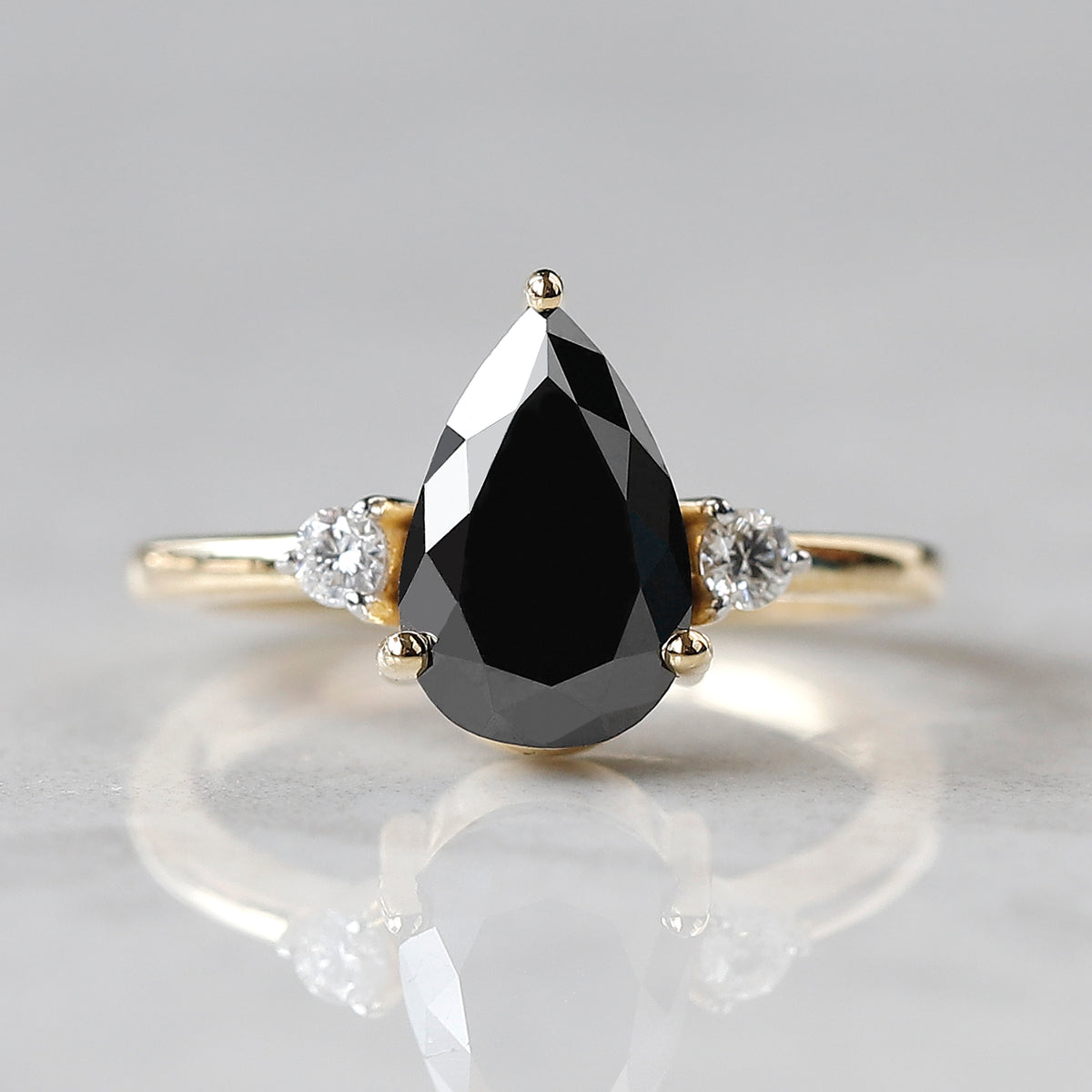 2.00 CT Pear Black Diamond & White Diamond Three-Stone Ring in 14K Yellow Gold