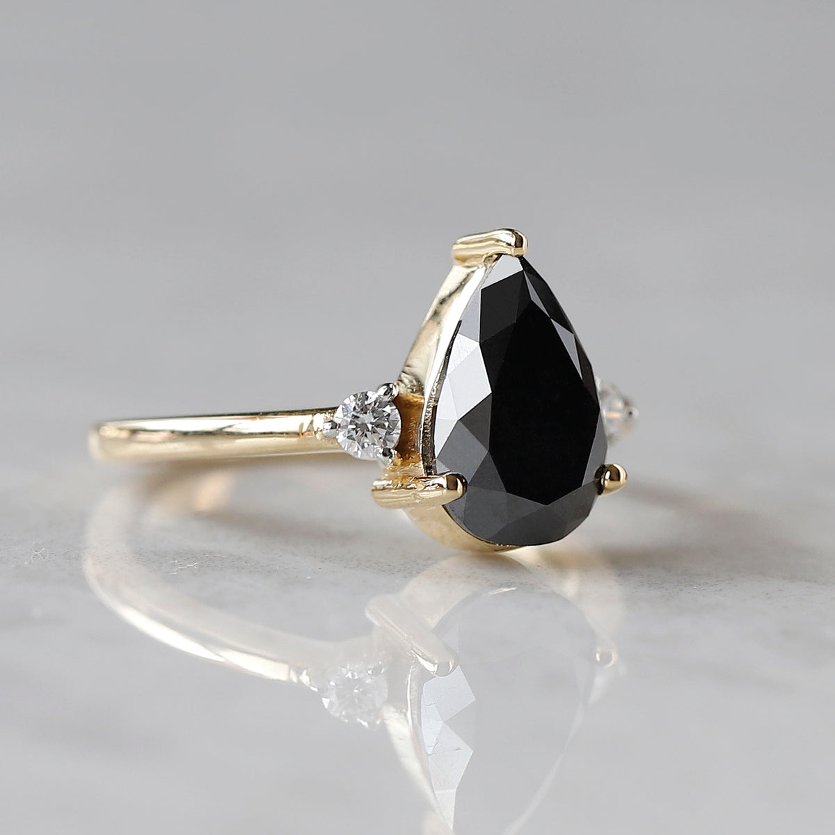 2.00 CT Pear Black Diamond & White Diamond Three-Stone Ring in 14K Yellow Gold