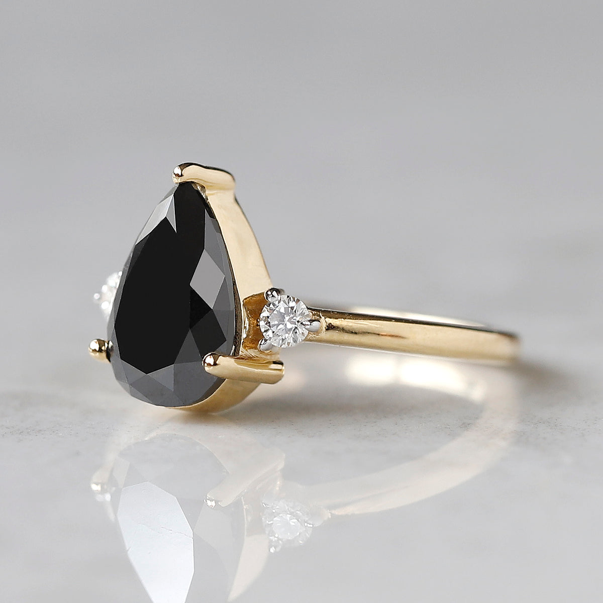 2.00 CT Pear Black Diamond & White Diamond Three-Stone Ring in 14K Yellow Gold