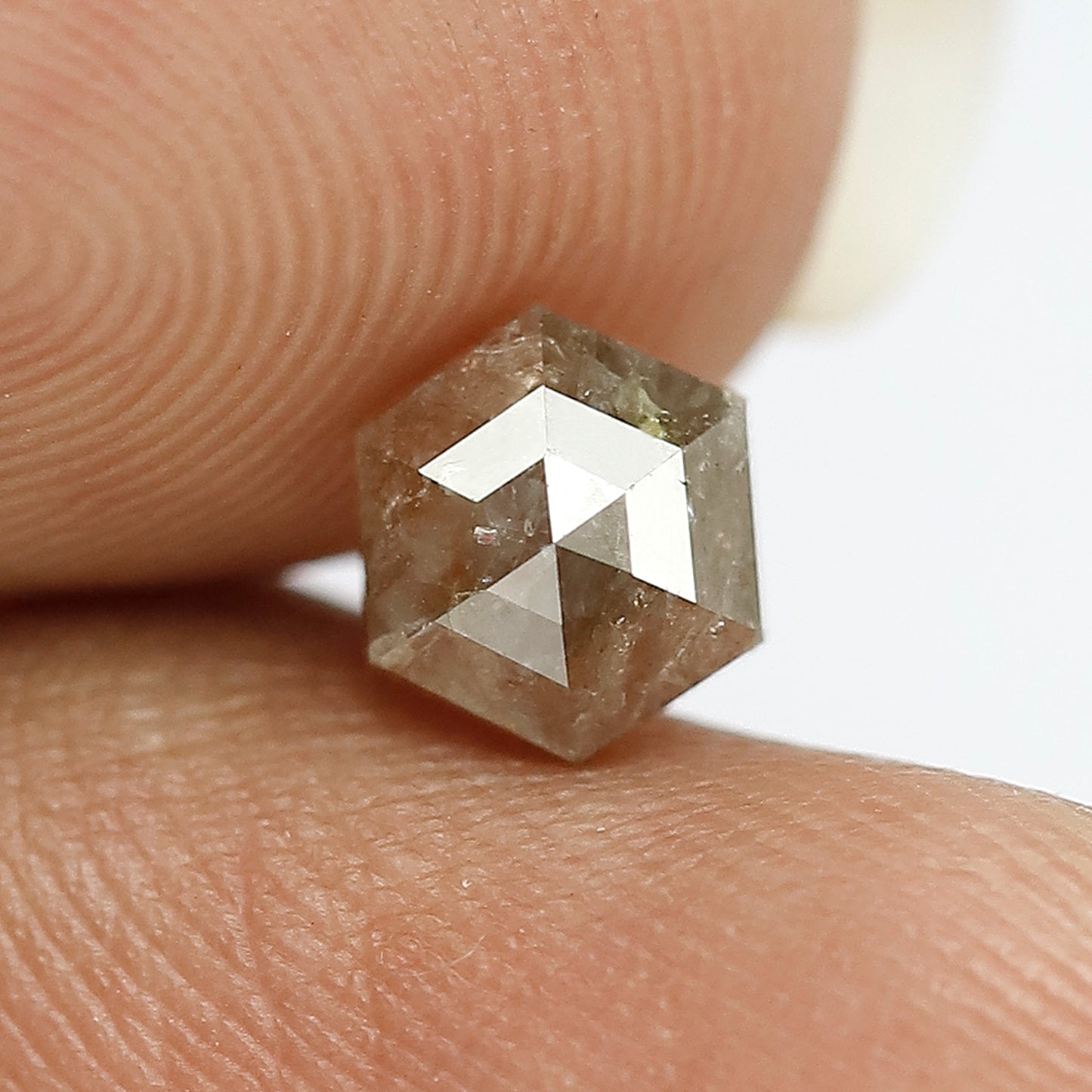 0.82 Ct Natural brownish red color Hexagon shaped Salt and pepper Loose ring