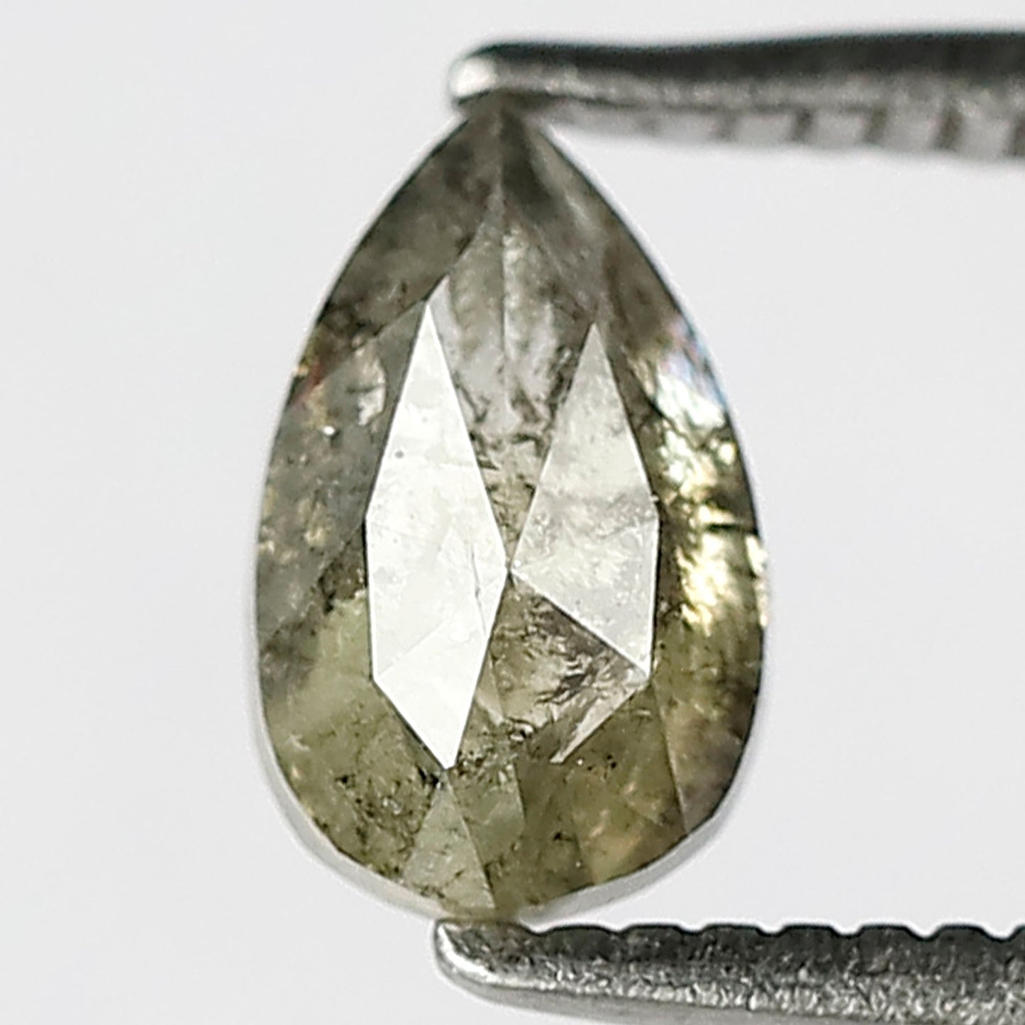 0.75 Ct pear shape Salt and Pepper diamond greenish diamond