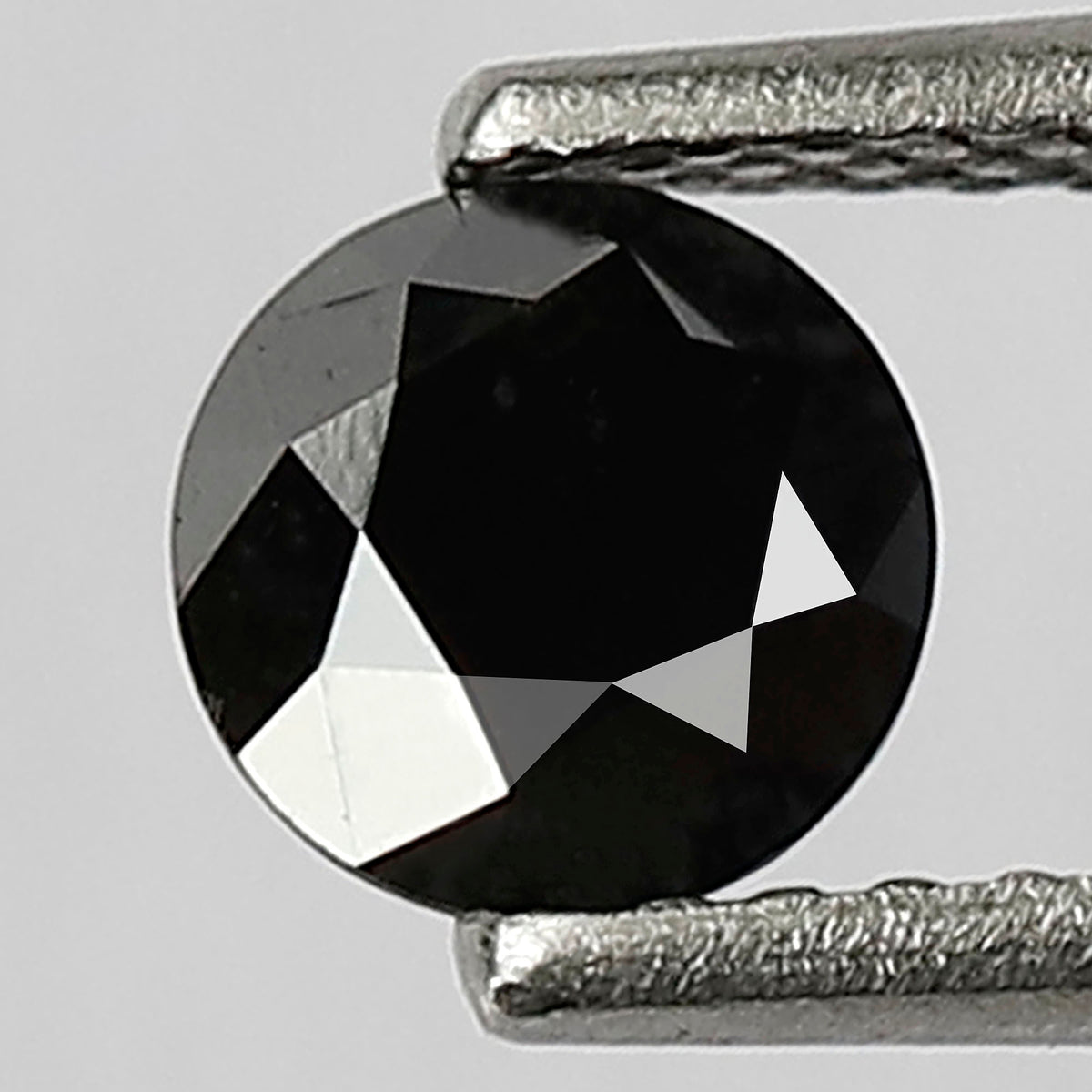 0.68 Carat Round Brilliant Cut Black Diamond, Heated Jet Black, Full Faceted
