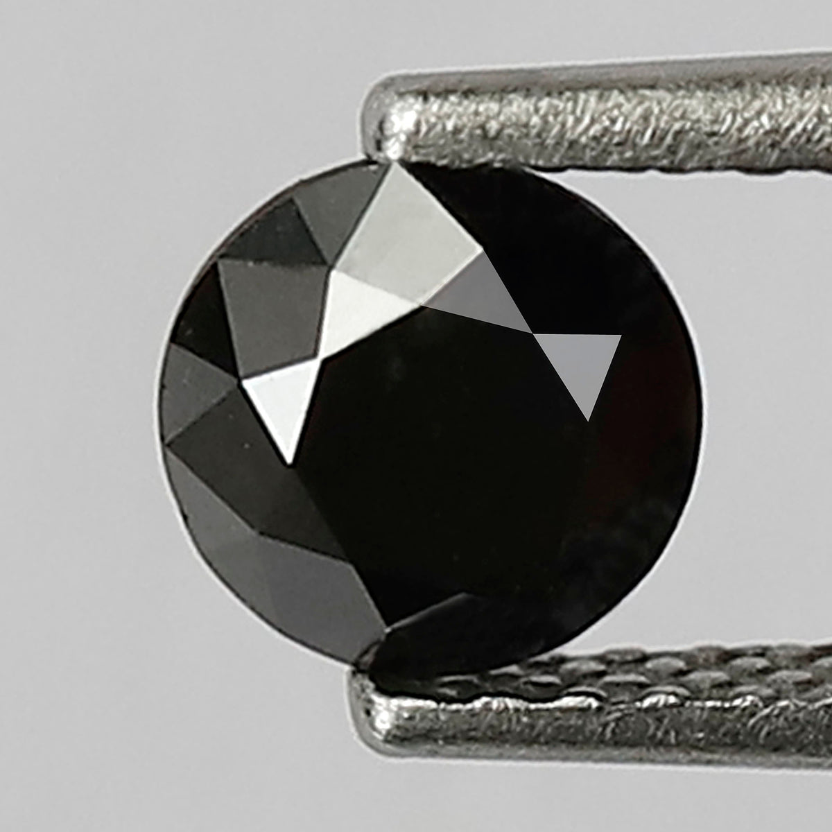 0.68 Carat Round Brilliant Cut Black Diamond, Heated Jet Black, Full Faceted