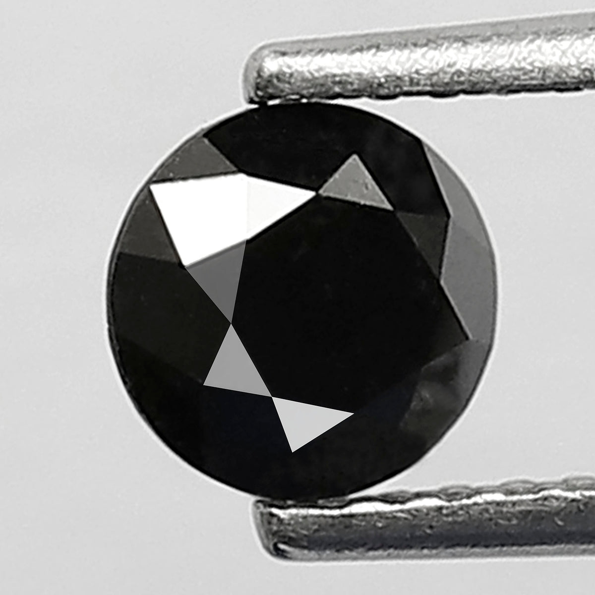 0.68 Carat Round Brilliant Cut Black Diamond, Heated Jet Black, Full Faceted