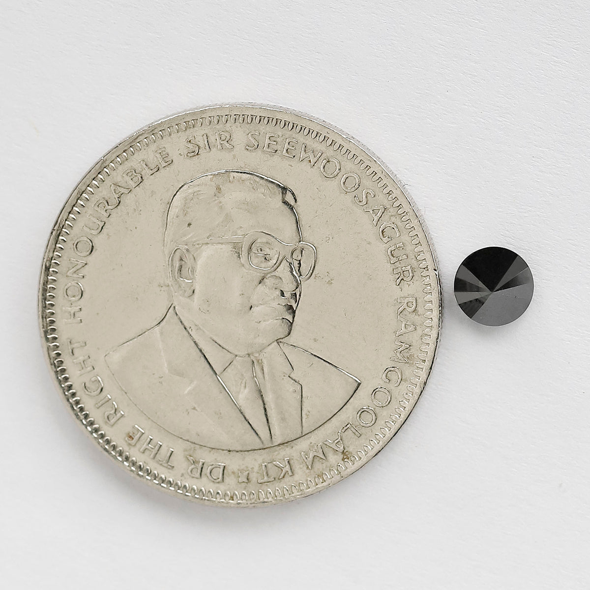 0.68 Carat Round Brilliant Cut Black Diamond, Heated Jet Black, Full Faceted