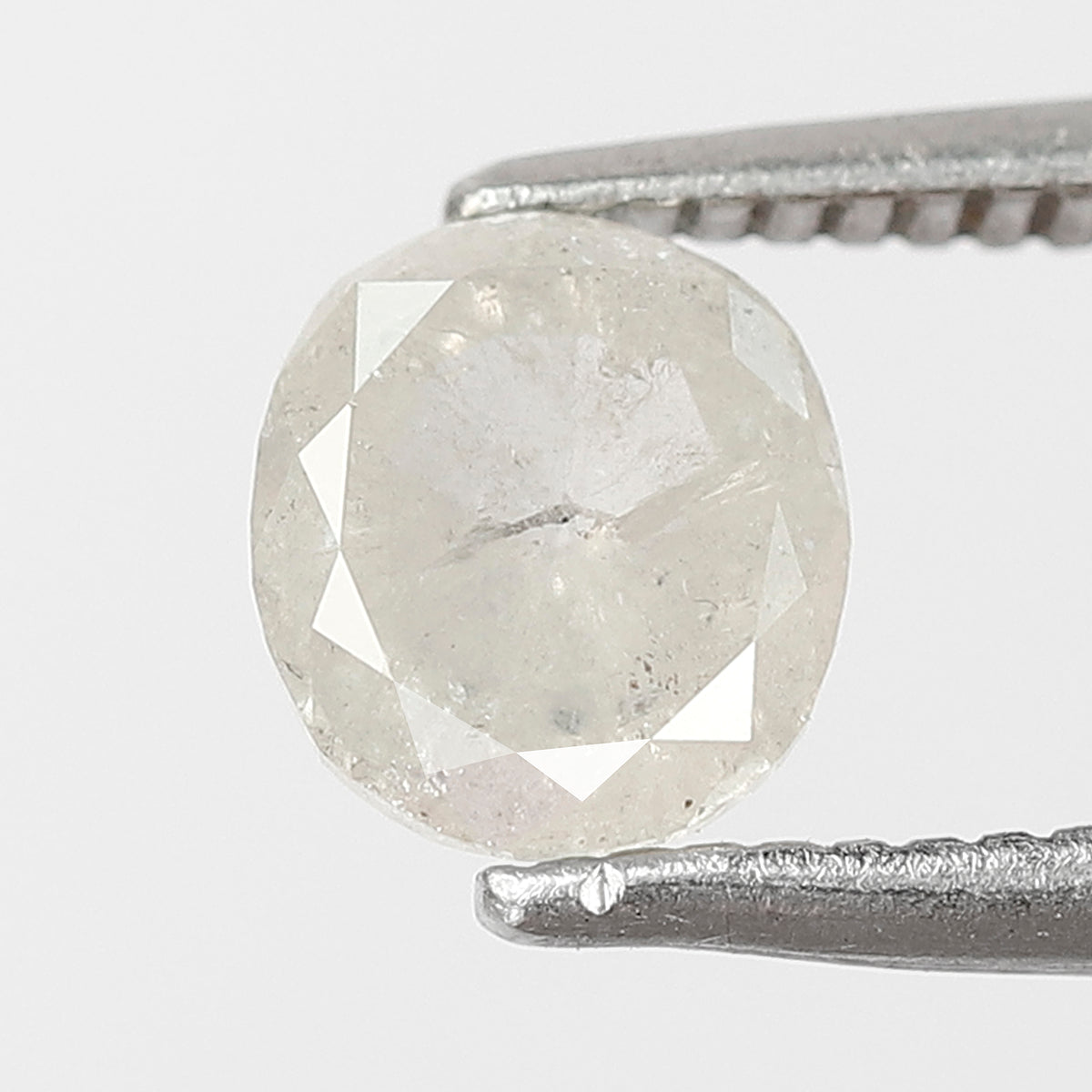 0.76 CT Oval shape Misty White color Natural loose 5.80 mm salt and pepper diamond