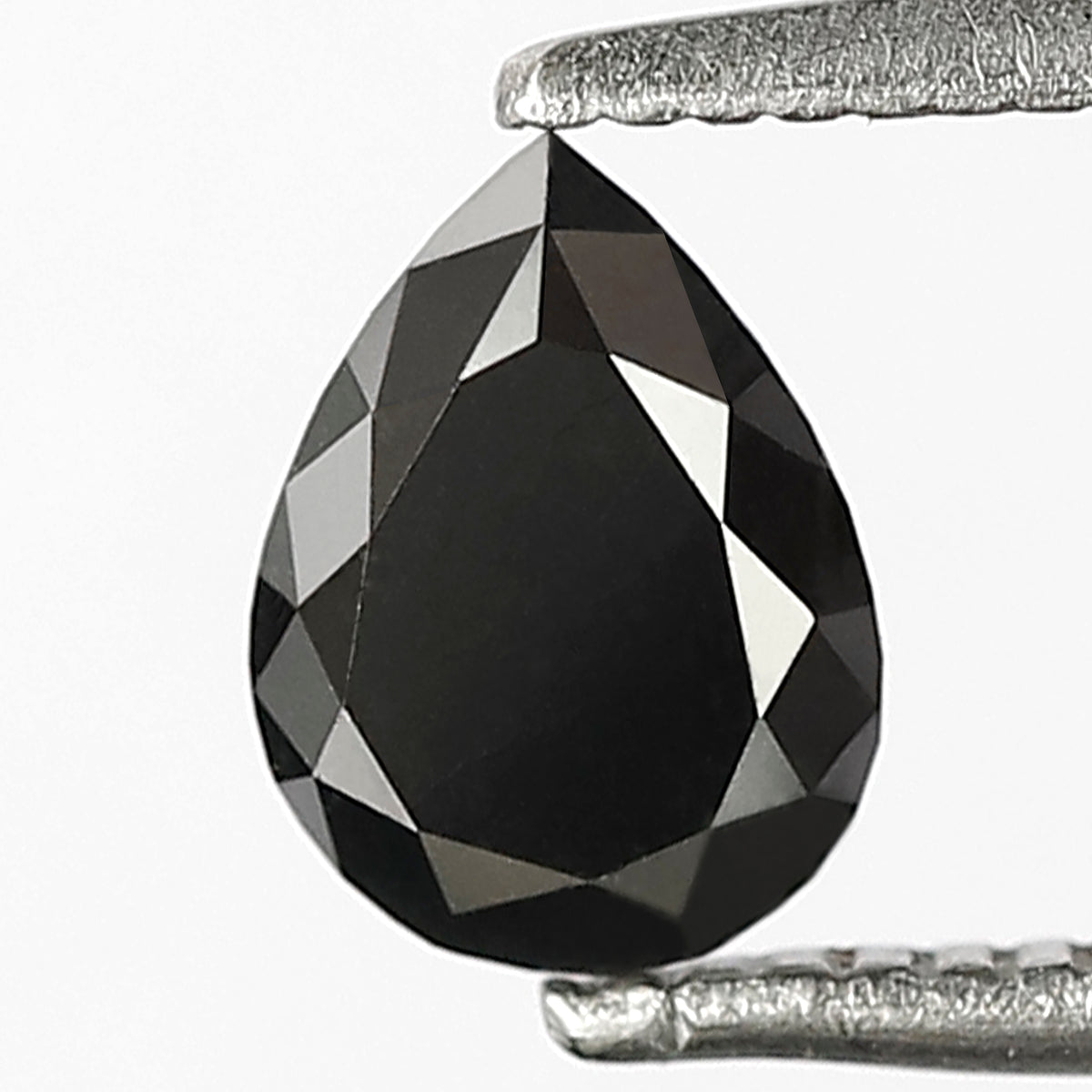 0.85 CT Pear Cut Diamond 6.70 MM Heated Black color Diamond For Engagement Ring