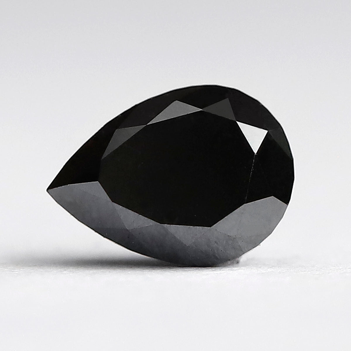 0.85 CT Pear Cut Diamond 6.70 MM Heated Black color Diamond For Engagement Ring