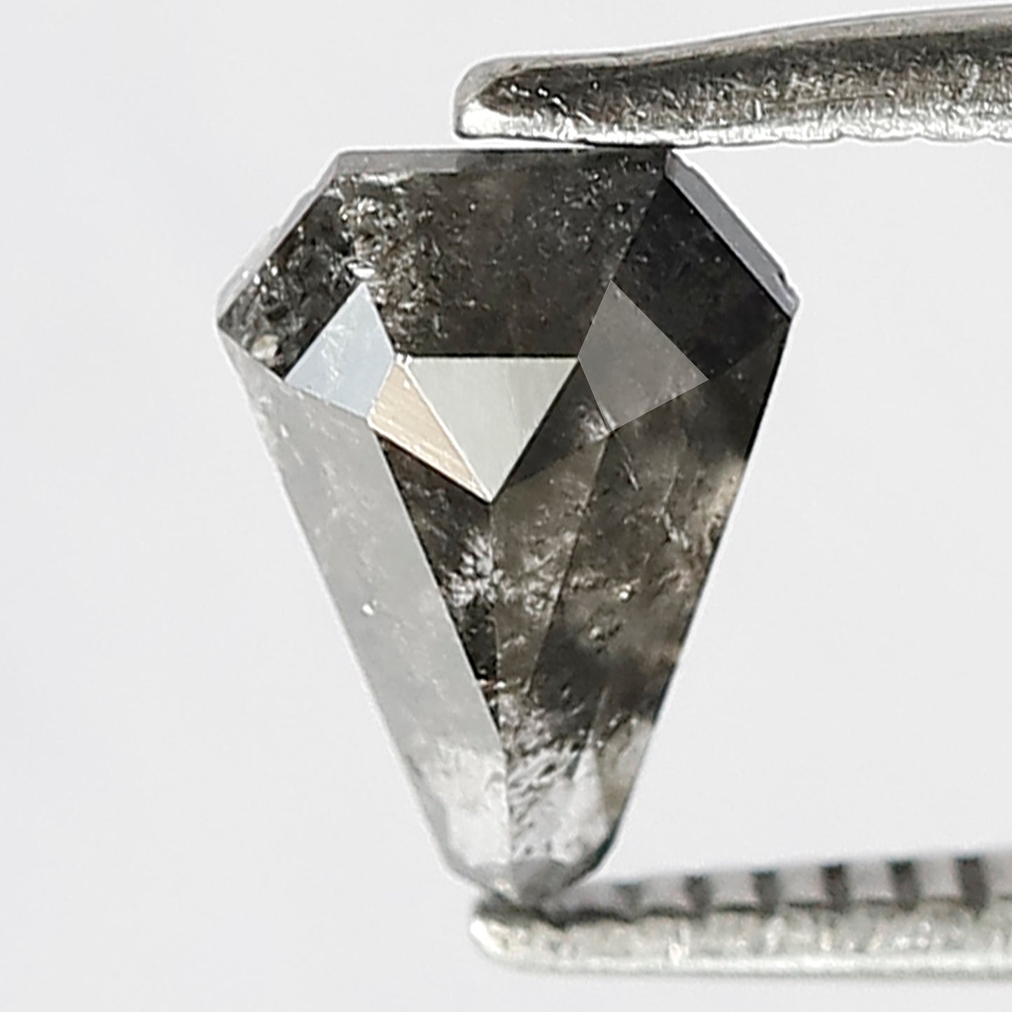0.77 CT Geometric shape Natural loose Grey Black color 7.60 MM Salt and pepper Diamond