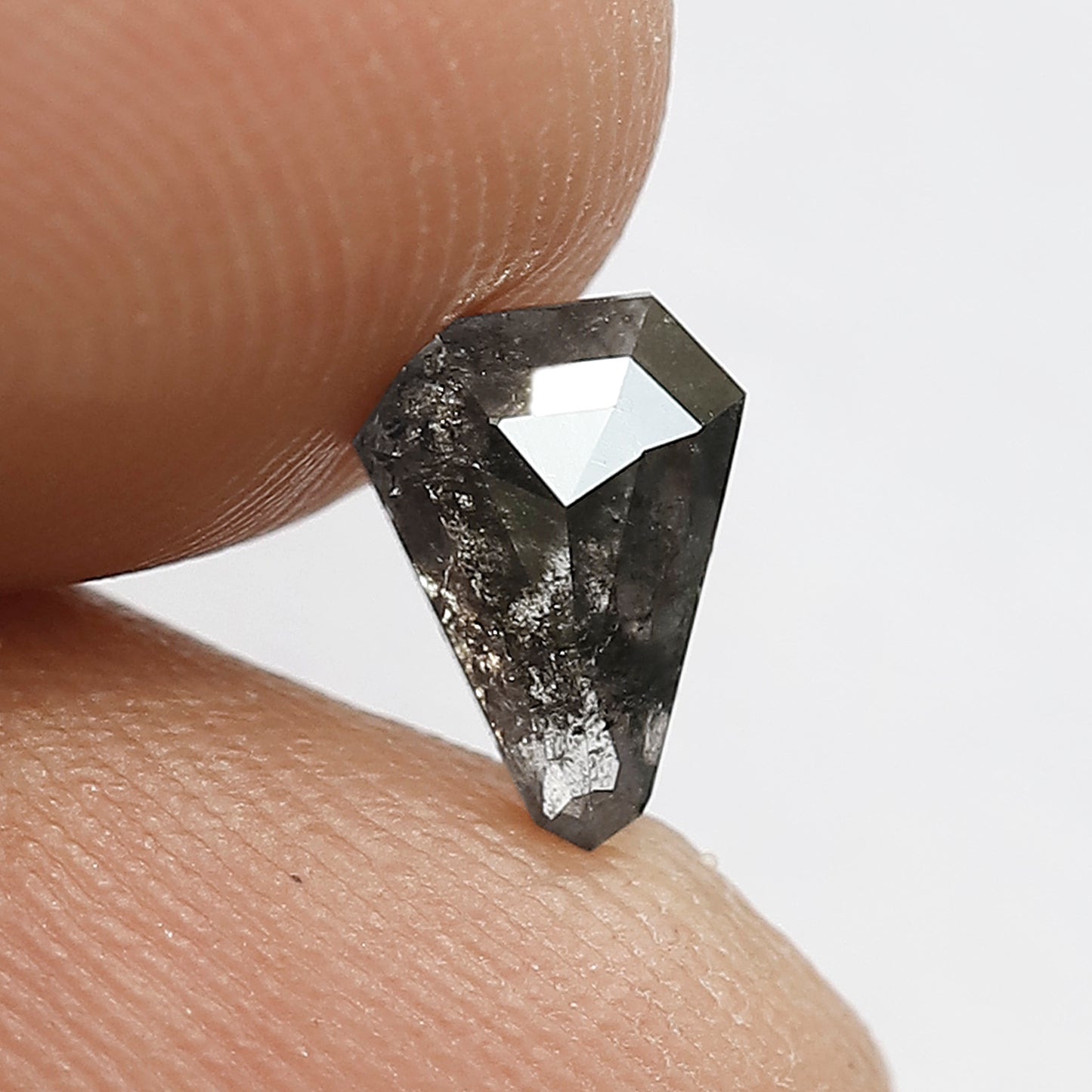0.77 CT Geometric shape Natural loose Grey Black color 7.60 MM Salt and pepper Diamond