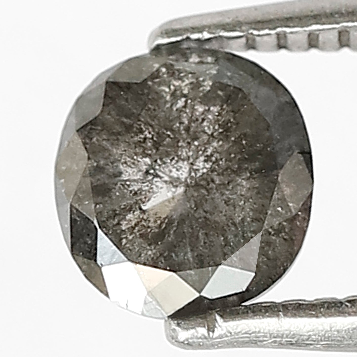 0.72 CT Oval shape Grey black color 5.70 MM Natural loose salt and pepper diamond