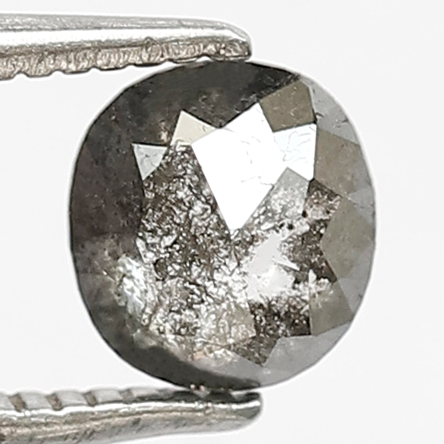 0.72 CT Oval shape Grey black color 5.70 MM Natural loose salt and pepper diamond