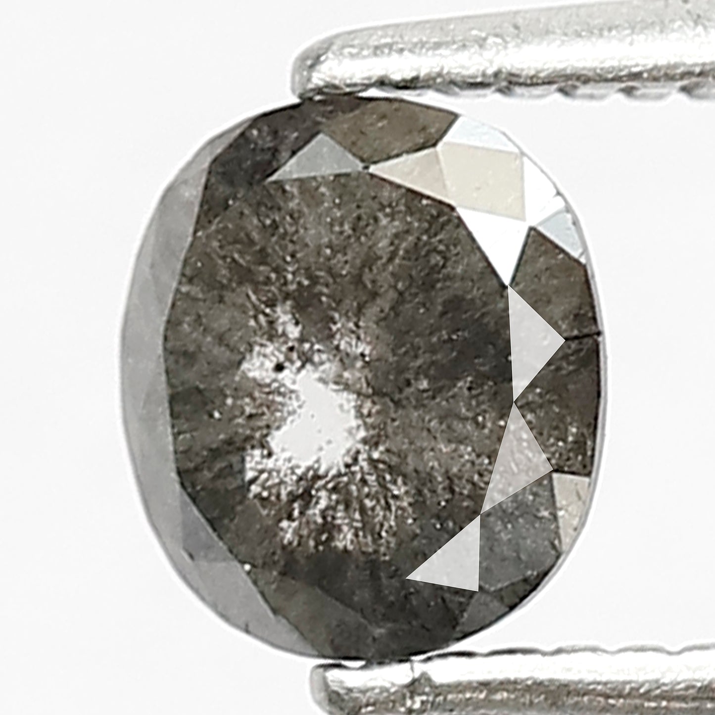 0.72 CT Oval shape Grey black color 5.70 MM Natural loose salt and pepper diamond