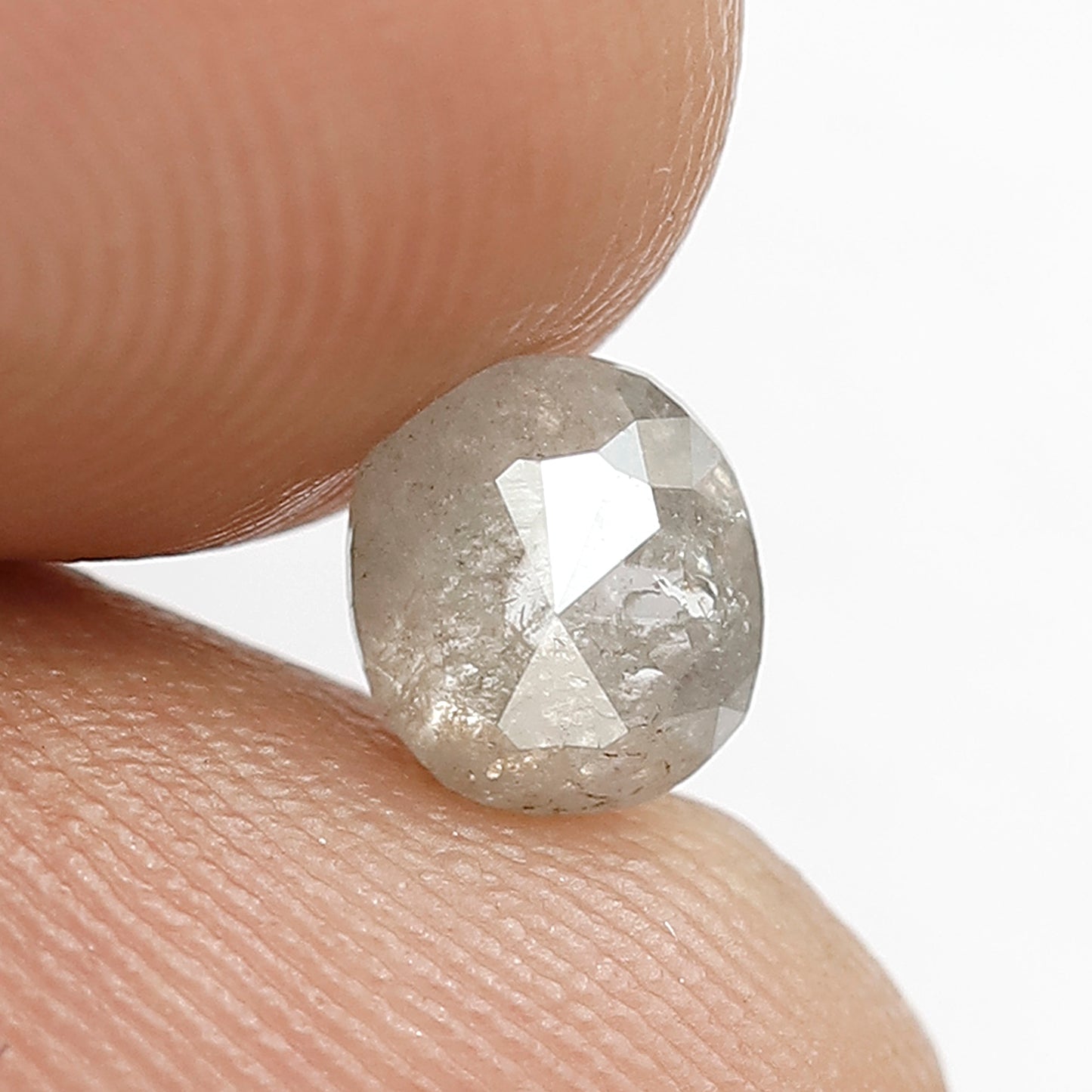 0.87 CT Oval shape Natural loose Grey Black color 5.80 MM Salt and pepper Diamond